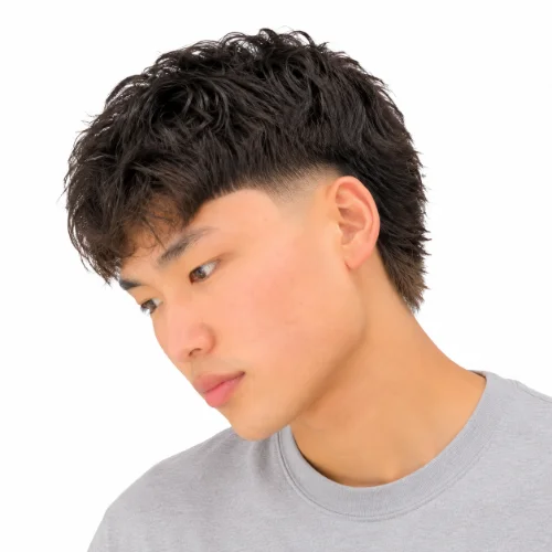 Asian man with an Asian mullet fade and textured top