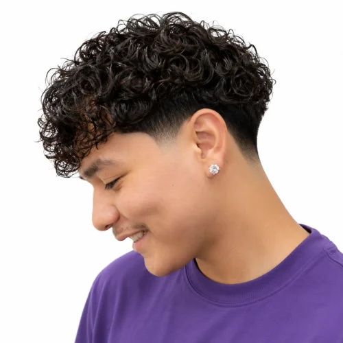 Low taper perm hairstyle with defined curls